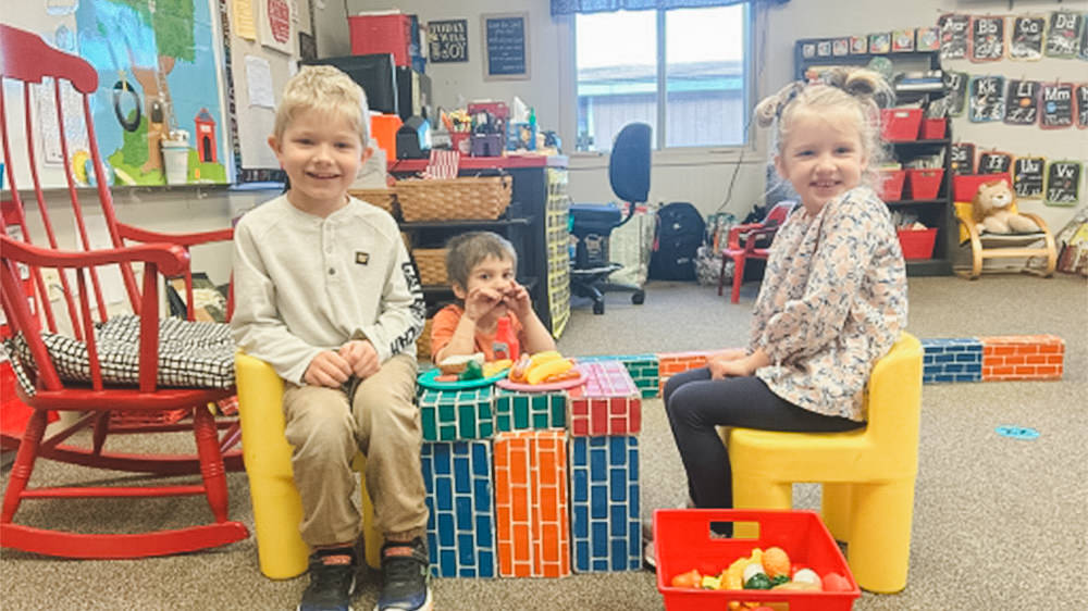 Preschool students learning and playing together in a nurturing classroom at Heritage Christian Academy